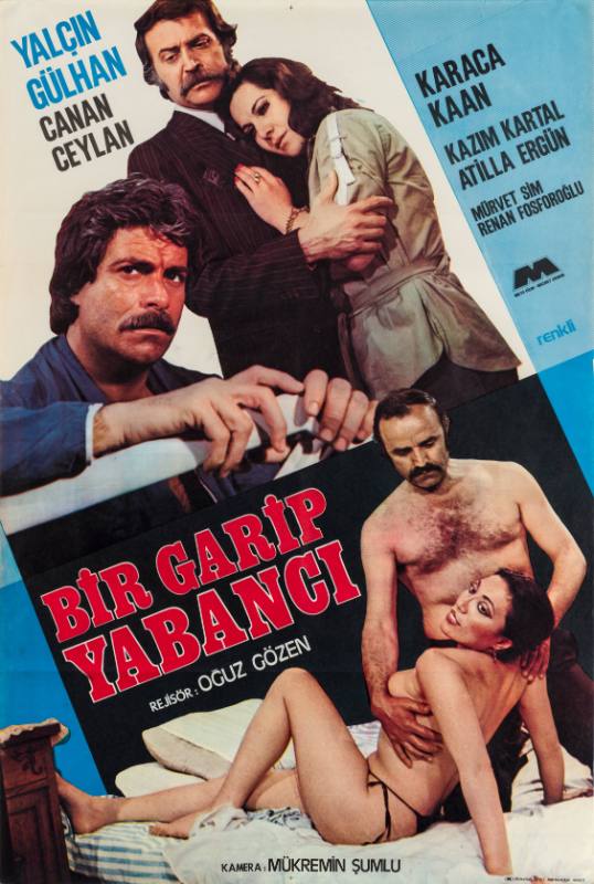 A poster of a nude woman with a toy covering her waist between two men kissing her hands in sheets.