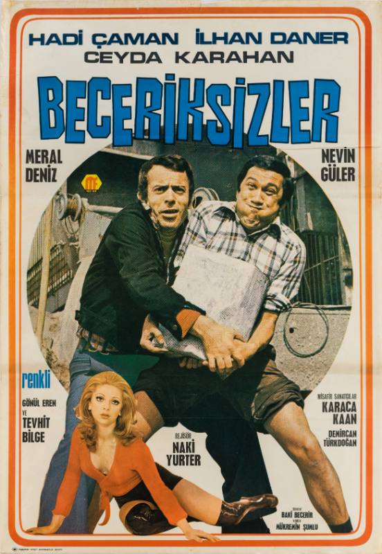 A poster of two men awkwardly carrying a heavy gray object by a woman wearing red laying down.