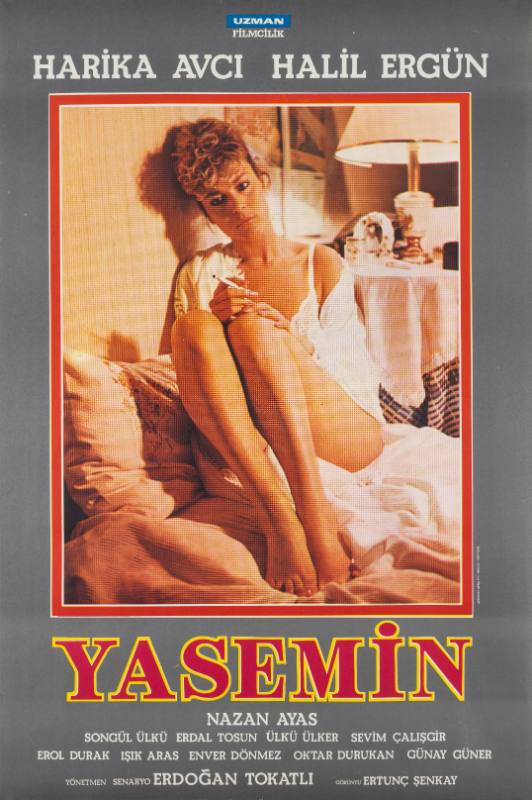 A poster of an image of a blonde woman in a white night gown curled in bed with a cigarette.
