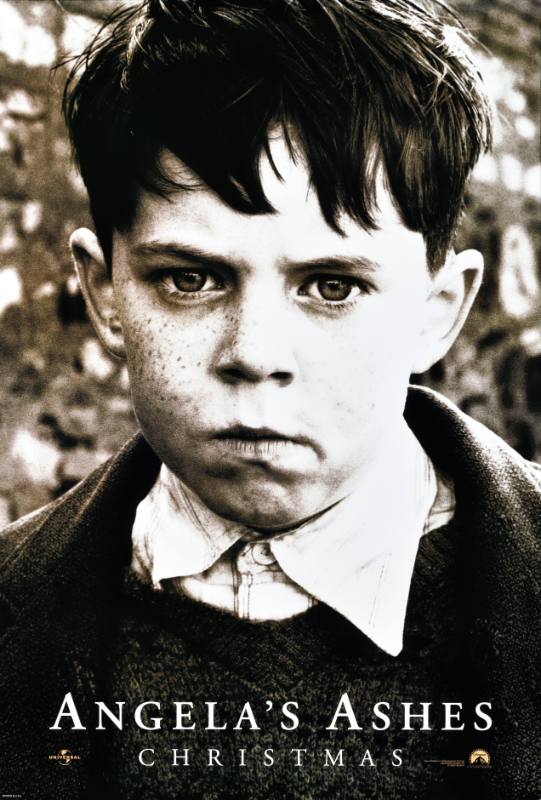 A poster of a young white boy looking at the camera sadly but defiantly