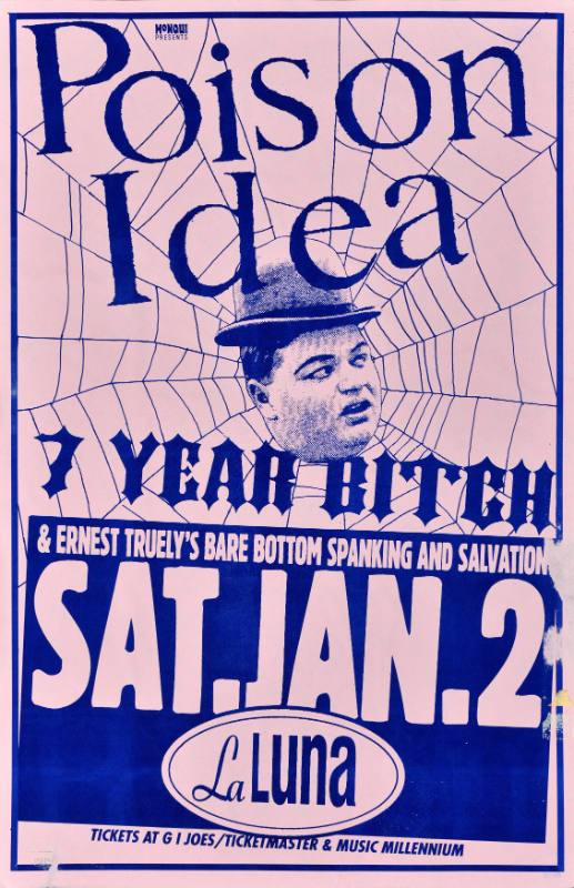 A poster of a white man's head at the center of a spider web