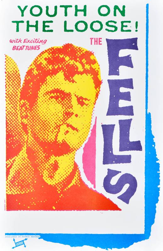 A poster of a serious looking white man's face printed in yellow and orange next to colorful text