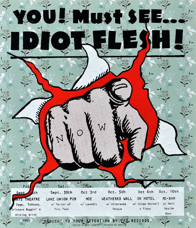 A poster of a finger punching through a wallpapered wall pointing at the viewer