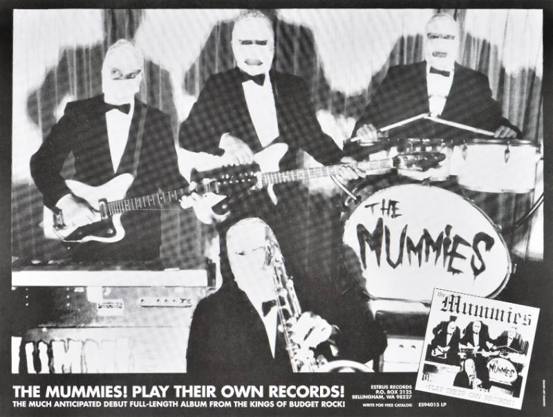 A poster of a group of men wrapped in bandages playing instruments