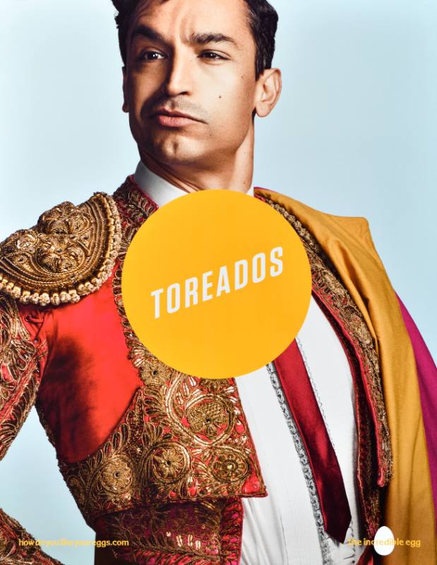 A poster of a matador with a yellow circle at his center