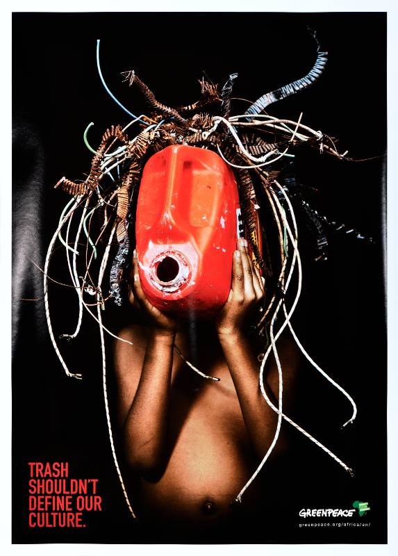 A poster of a Black figure holding a mask made out of trash