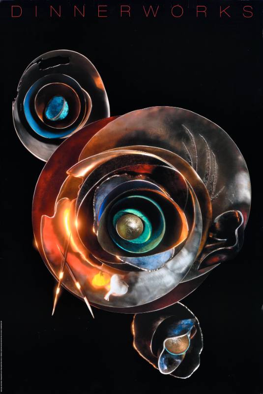 A poster of three metal sculptures shaped like flowers on a black background