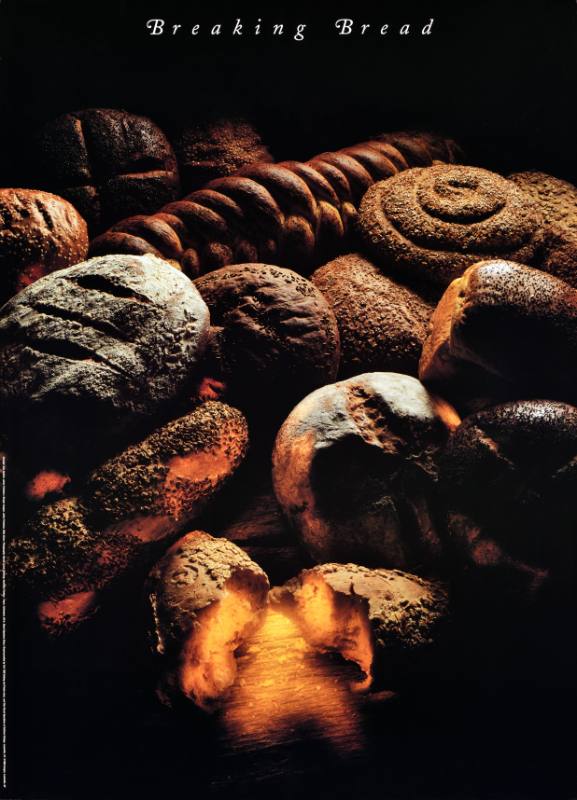 A poster of a pile of fluffy loaves of bread
