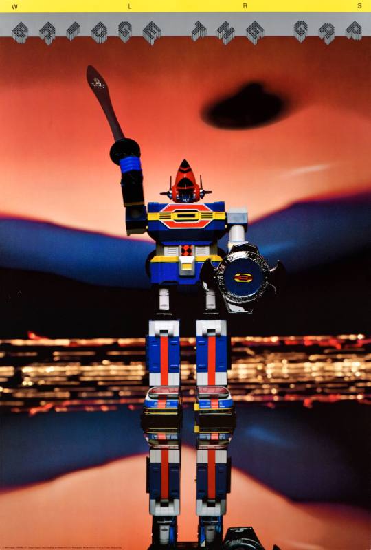 A poster of a toy robot against a sunset background