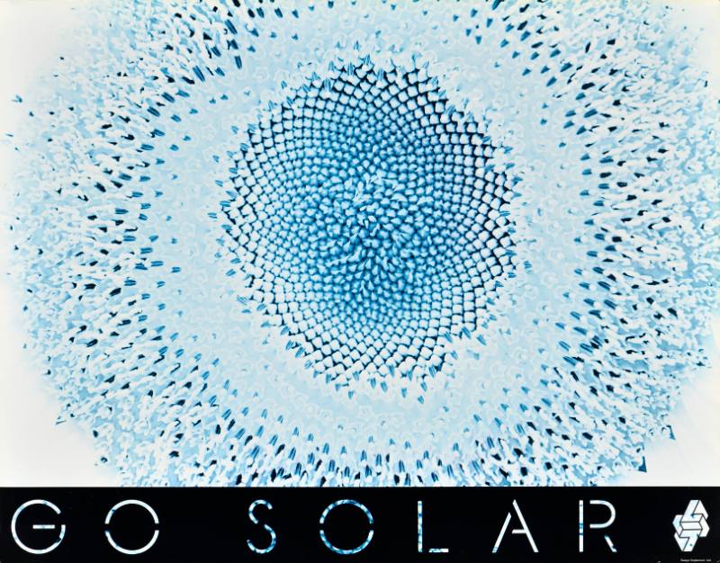 A poster of the inside of a neon blue flower