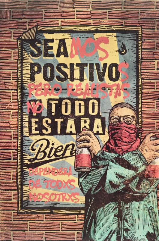 A poster of a man in a mask holding spray paint cans with crossed arms in front of a poster on a brick wall