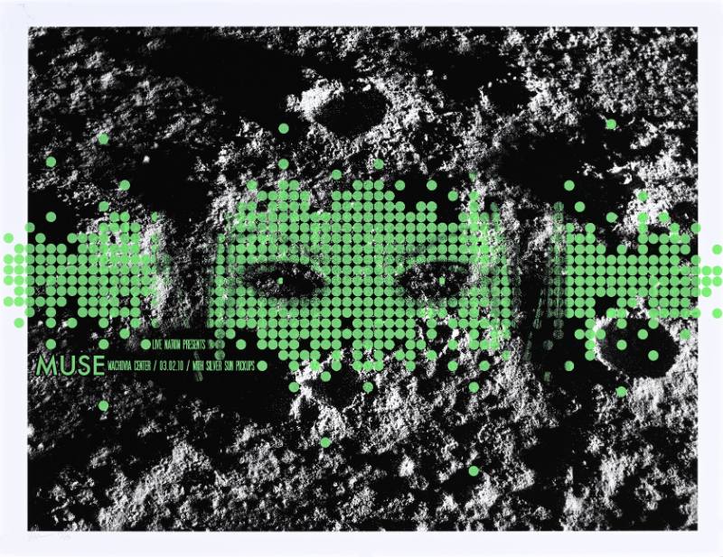 A poster of a mask made out of green dots over the surface of the moon