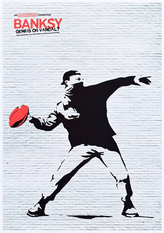 A poster of a man with a baseball hat throwing a football painted on a brick wall
