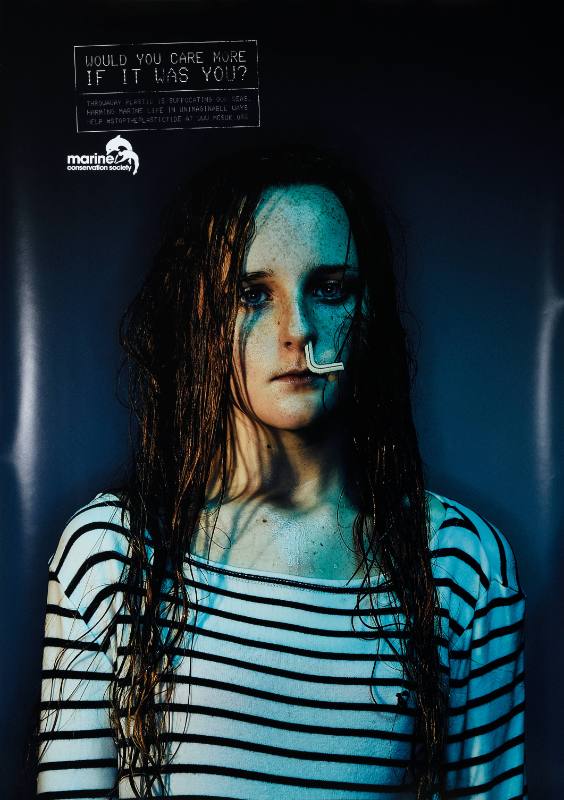 A poster of a girl with a plastic tube stuck up her nose