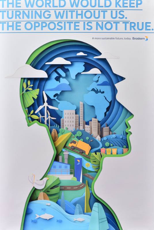 A poster of a person's silhouette made out of landscapes