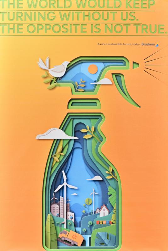 A poster of a spray bottle made out of landscapes