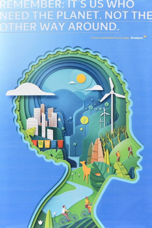 A poster of a person's silhouette made out of landscapes