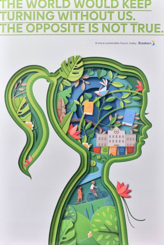 A poster of a person's silhouette made out of landscapes