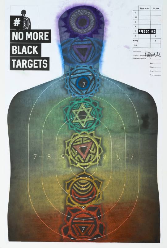 A poster of a practice target for shooting shaped like a man covered in colorful paint
