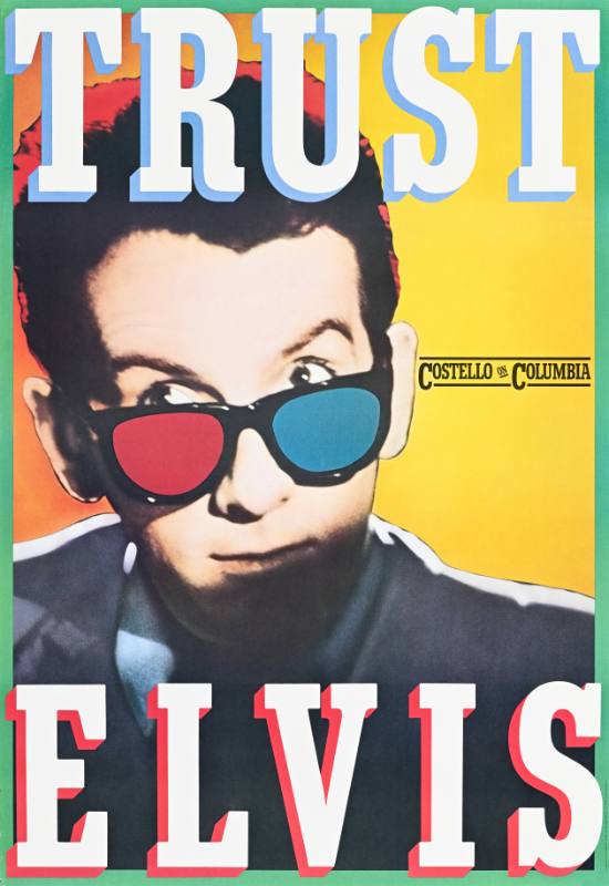 A poster of a white man with blue and red glasses below 3d text