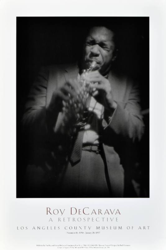 A poster of a Black man playing a trumpet