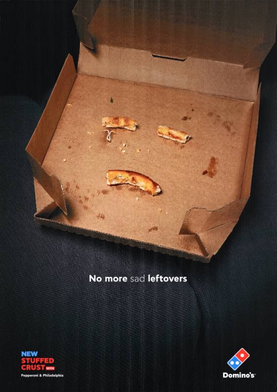 A poster of an empty pizza box with crusts forming a sad face inside