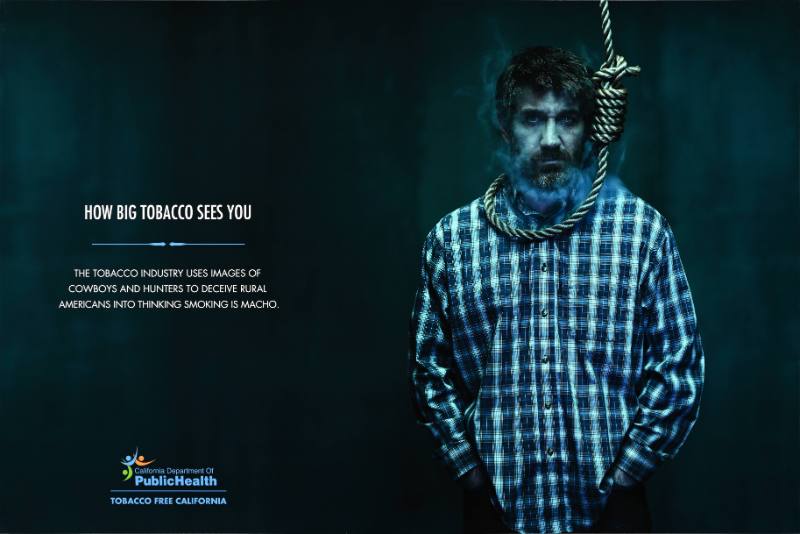 A poster of a white man with a noose around his neck