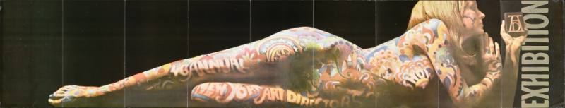 A poster of a nude woman covered in paint