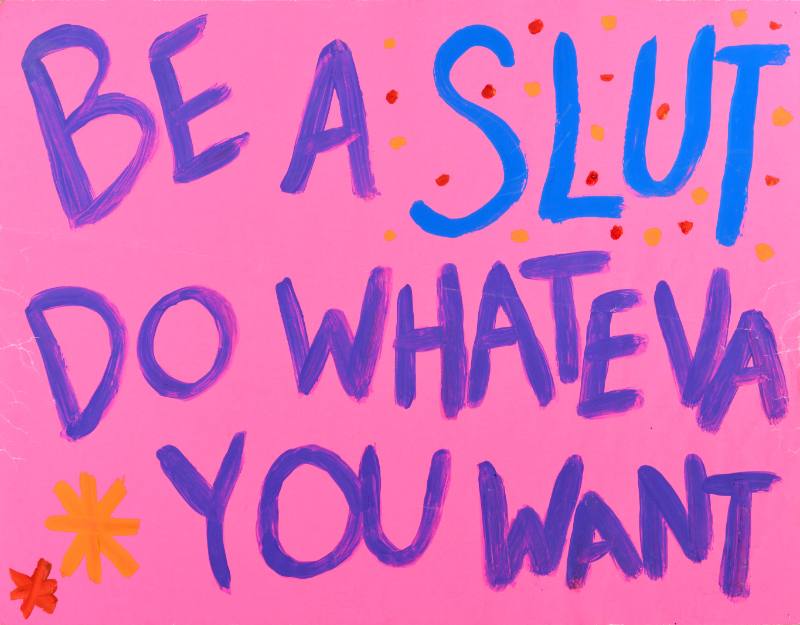 A poster of colorful text on a pink background