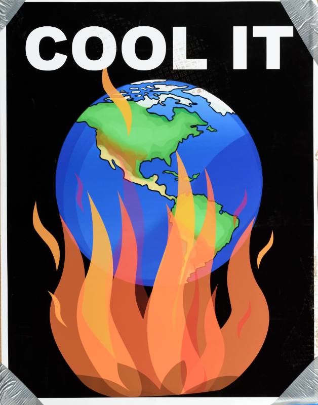 A poster of the Earth on fire on a black background