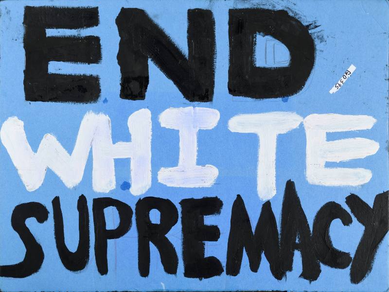 A blue text based poster with black and white letters