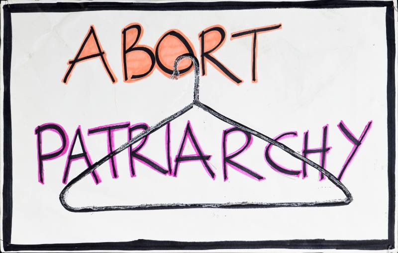 A poster of wire hanger on a grey background with a black border