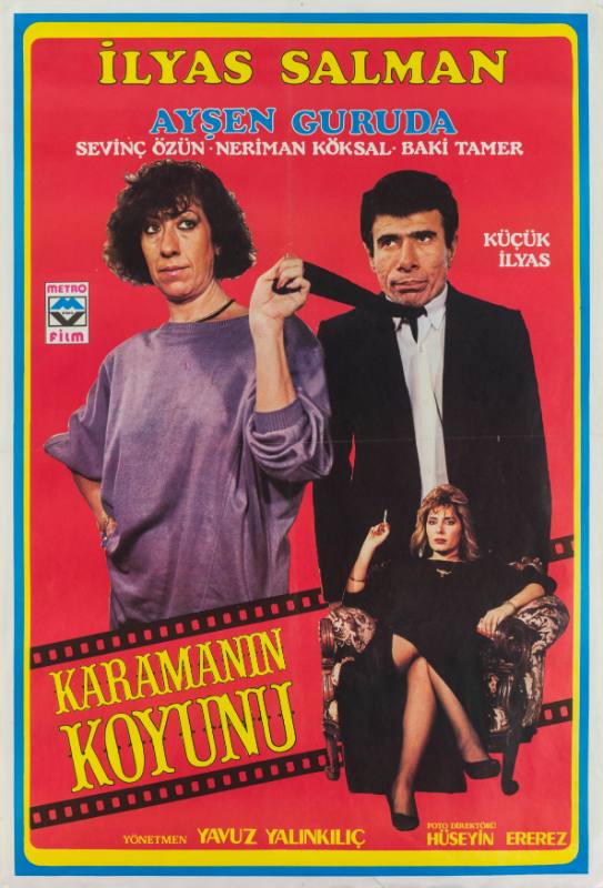 A poster of a woman pulling a man by his tie and a woman seated cross legged in a chair.