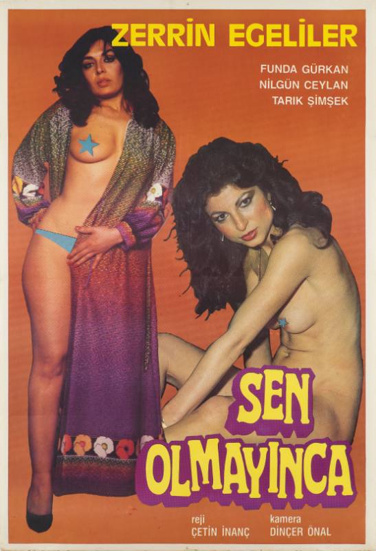 A photomontage poster of 2 women one topless standing in an open silk robe, one nude, seated.