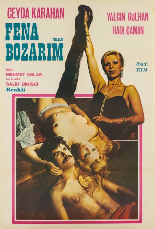 A poster of a topless couple lying on their backs on the floor with their heads together.