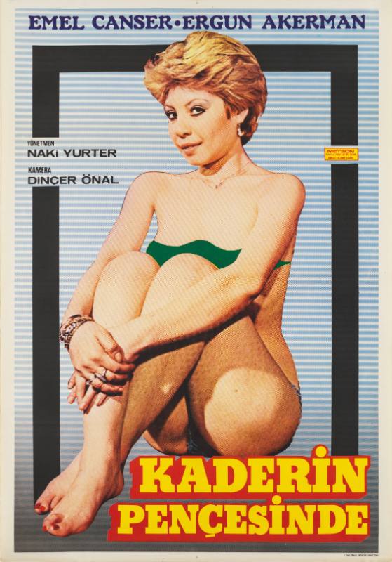 A poster of a woman with short blond hair, seated, wearing a green bikini.