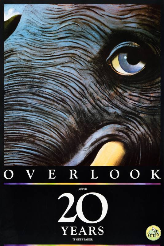 A poster featuring a closeup of a bright blue eyed elephant's face.
