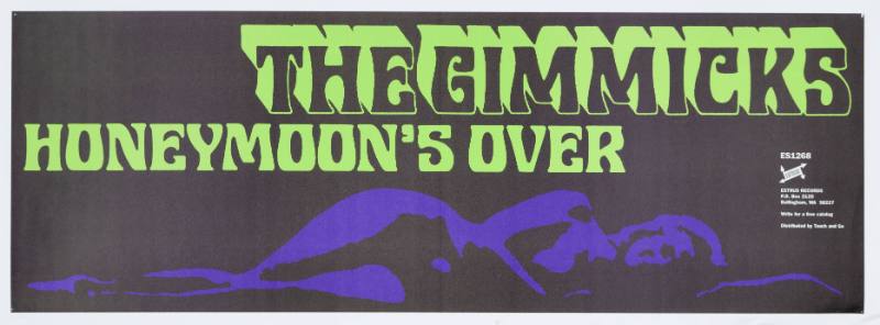 A poster of a naked woman lying down.