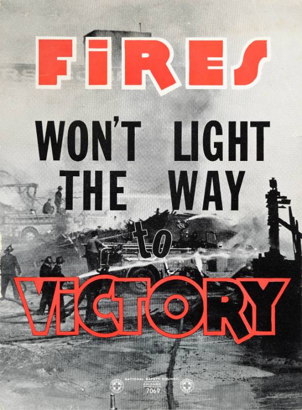 A black and white photographic poster of firemen standing in a burnt out building.